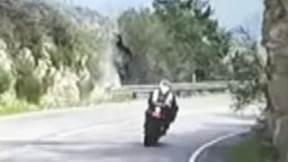 Motorcycle flips over cliff in scary crash caught on tape [upl. by Dickinson]